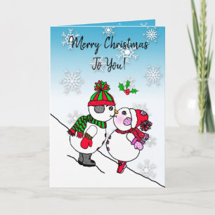Carte Kissing Snowman et Snowwoman sous la Mistletoe