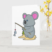 Carte Koala en pêcheur avec canne à pêche et poisson (Fleur jaune)