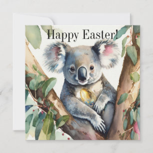 Carte Koala tenant un œuf de Pâques en or