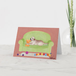 Carte Labrador jaune sur le canapé vert
