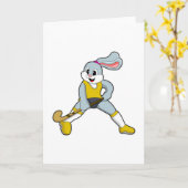 Carte Lapin au hockey avec une batte de hockey (Fleur jaune)