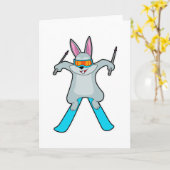 Carte Lapin en skieur avec ski (Fleur jaune)