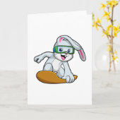 Carte Lapin en snowboardeur avec snowboard (Fleur jaune)