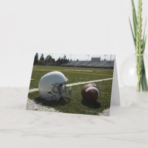 Carte Le football et casque de football sur le terrain