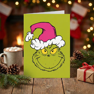 Carte Le Grinch avec un chapeau de Père Noël rose