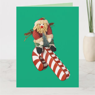Carte Le Père Noël joue sur un toboggan en canne à sucre
