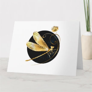 Carte libellule d'or en cercle noir