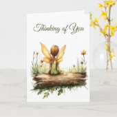 Carte Lonely Fairy assis sur un journal (Fleur jaune)