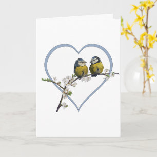 Carte Lovebirds assis sur le coeur de la branche de la f