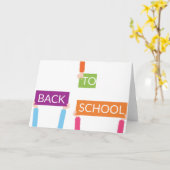 Carte Mains tenant des pancartes RETOUR À L'ÉCOLE (Fleur jaune)