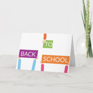 Carte Mains tenant des pancartes RETOUR À L'ÉCOLE