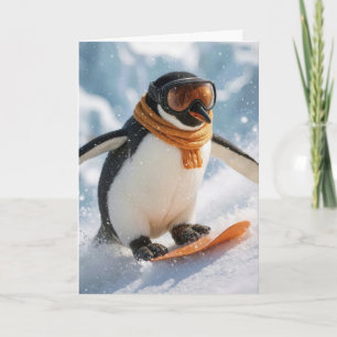 Carte Manchot de Noël faisant du snowboard en descente