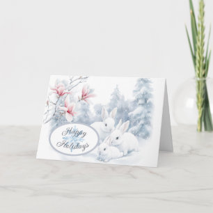 Carte Mignons lapins blancs en vacances d'hiver neige
