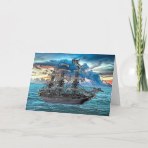 CARTE NAVIRE PIRATE ANCRÉ AU COUCHER DU SOLEIL