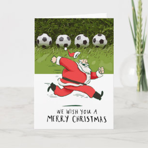 Carte Noël de football avec le Père Noël jouant au ballo