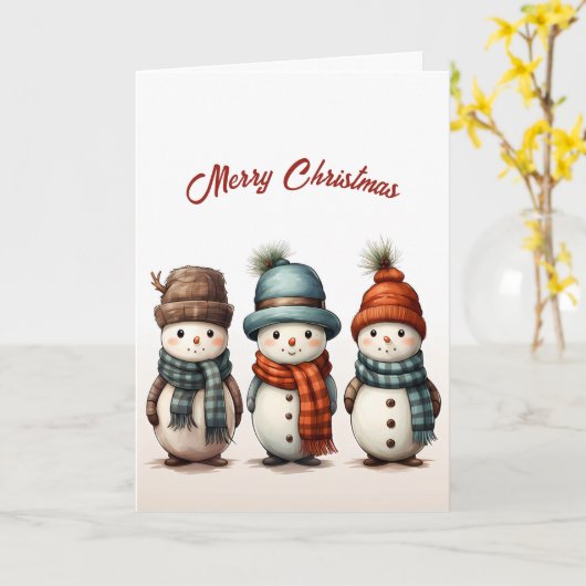 Carte Noël des mignons trois neigeurs (Fleur jaune)