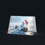 Carte Noël Melting Snowman Humour<br><div class="desc">Un bonhomme de neige fondu est assis sur un rond portant un casquette du Père Noël entouré de glace fondante et de neige sous un soleil éclatant.</div>