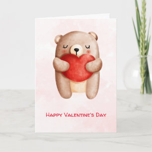 Carte Nounours en peluche portant un cœur rouge pour la