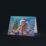Carte Octopus de Noël portant un chapeau de Père Noël<br><div class="desc">Une scène sous-marine géante abrite une pieuvre portant un chapeau de Père Noël entouré de coraux colorés et d'un sapin décoré. Tout le texte peut être modifié.</div>