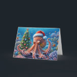 Carte Octopus de Noël portant un chapeau de Père Noël<br><div class="desc">Une scène sous-marine géante abrite une pieuvre portant un chapeau de Père Noël entouré de coraux colorés et d'un sapin décoré. Tout le texte peut être modifié.</div>