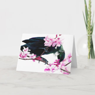 Carte Oiseau de Tui alimentant sur des fleurs de