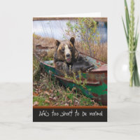 Ours d'anniversaire dans le bateau de rangée