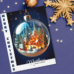Carte Paysages de Noël spectaculaires dans un bauble tra<br><div class="desc">Cette belle aube de Noël contient un village de montagne entier dans la neige, le tout illuminé pour Noël. Beau décor pour cette carte de Noël personnalisée. Changez le nom du destinataire pour le rendre vraiment unique ! L'intérieur est laissé blanc, vous pouvez donc choisir d'écrire votre propre texte dans...</div>