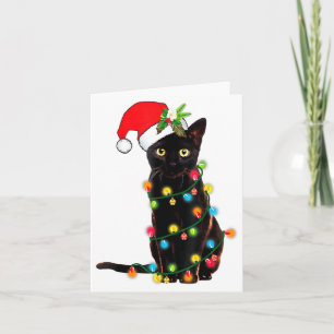 Carte Père Noël chat noir emmêlé dans les lumières de No