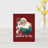 Carte Père Noël lit des livres interdits (Fleur jaune)