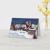 Carte Père Noël livrant des livres à Noël (Fleur jaune)