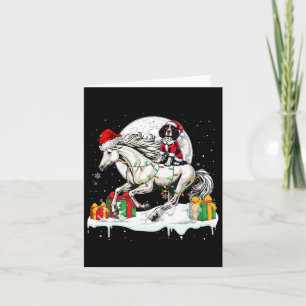 Carte Père Noël Springer Spaniel Anglais à cheval sur un
