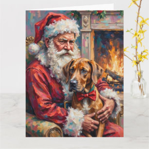 Carte Père Noël tenant une œuvre d'art de Noël de Grand