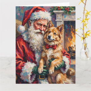 Carte Père Noël tenant une œuvre d'art de Noël de Lundeh