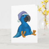 Carte Perroquet au lit avec un bonnet de nuit (Fleur jaune)