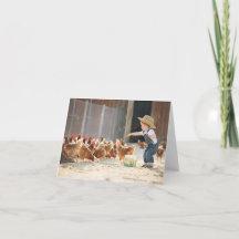 Petit fermier nourrissant des poulets