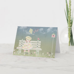 Carte petite fille sur le banc du parc