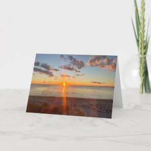 Carte Photo du coucher de soleil sur la plage de Cape Co