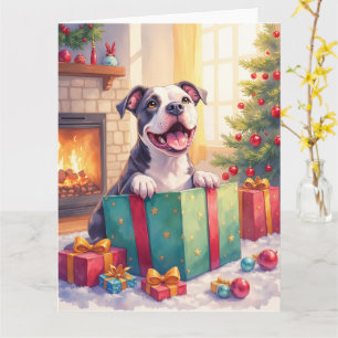 Carte Pitbull joueur ouvrant des cadeaux de Noël de vaca
