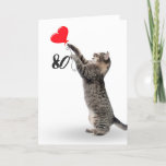 Carte playful tabby cat for 80th birthday card<br><div class="desc">Chatte de tabby gris avec ballon de coeur rouge pour 80e anniversaire sur arrière - plan blanc. La couleur Arrière - plan peut être modifiée</div>