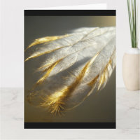 Plumes blanches dorées
