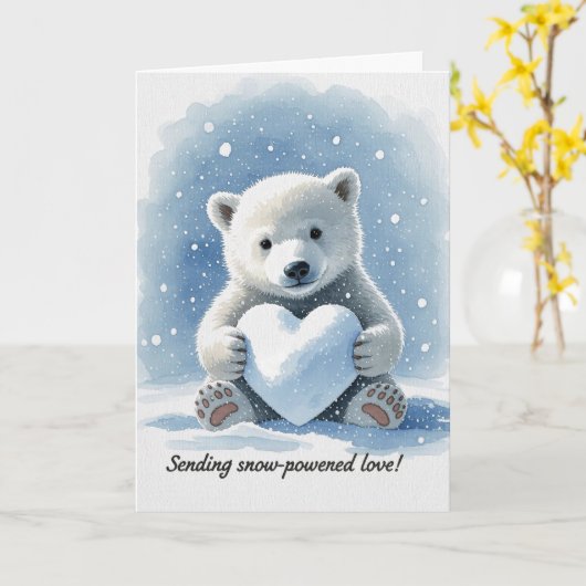 Carte Polar bear in the snow with heart shaped snowball (Fleur jaune)
