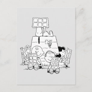 Carte Postale Bande de Peanuts lisant des bandes dessinées