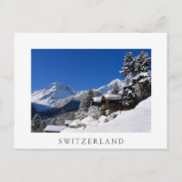 Cabines en rondins enneigées en Suisse