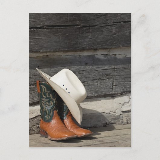 Carte Postale Casquette Cowboy sur bottes de cowboy devant un ca (Devant)