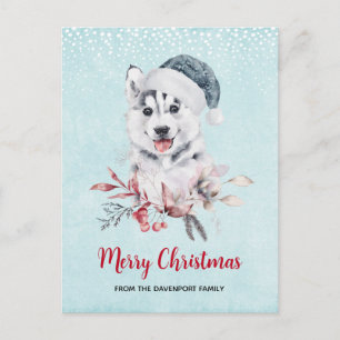 Carte Postale Chien de Noël Husky dans un chapeau de Père Noël