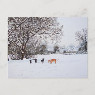 Carte Postale chiens jouant en paysage neigeux à noël