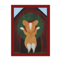 Corgi posant une couronne de Noël sur une niche po