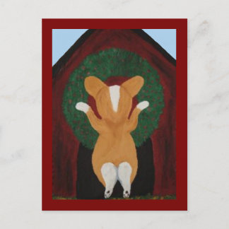 Carte Postale Corgi posant une couronne de Noël sur une niche po