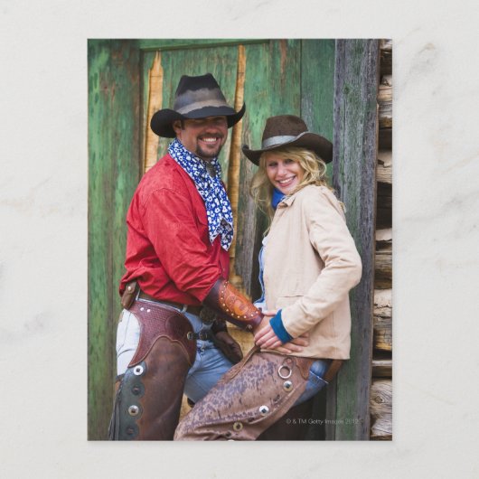 Carte Postale Cowboy et cow-girl tenant des mains devant (Devant)