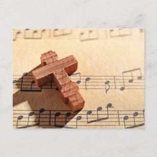 Carte Postale Croix en bois sur papier de musique en feuille